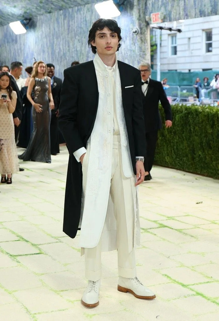 Wearing Thom Browne Vancouver actor Finn Wolfhard arrives for the 2026 Met Gala celebrating at Museum of Art, in New York, on May 4.