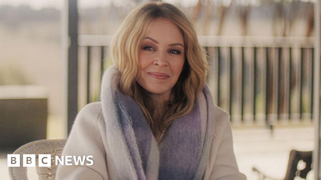 Kylie Minogue reveals she had second cancer diagnosis in 2021 - BBC