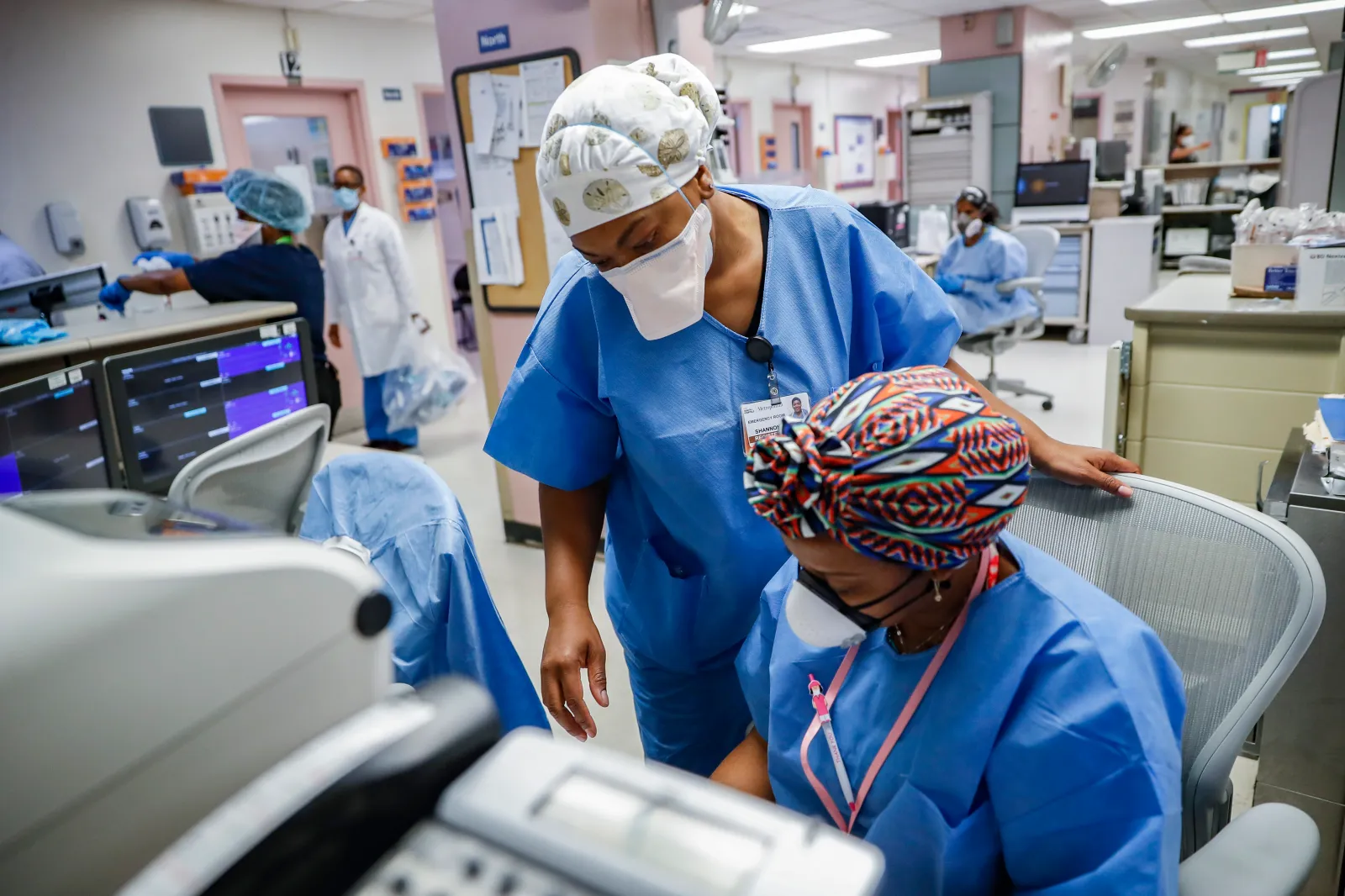 Medical personnel work in the emergency department at NYC Health + Hospitals Metropolitan, Wednesday, May 27, 2020, in New York.