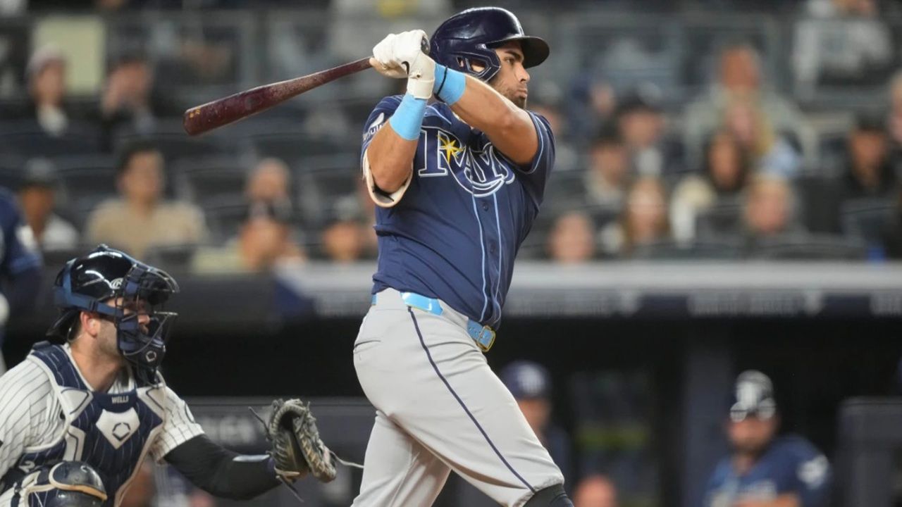 Tampa Bay's Jonathan Aranda hits an RBI double in the eighth inning of the Rays' 4-2 win against the Yankees Friday night in New York. (AP Photo/Yuki Iwamura)