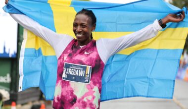 CHEBOI, AREGAWI WIN WET AND COLD OTTAWA MARATHON