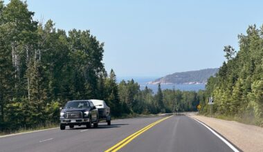 Is it legal to cross a yellow solid double line in Ontario?