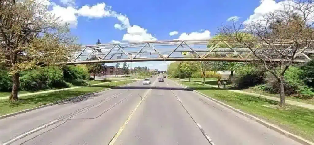 pedestrian bridge closes for paving work in mississauga.