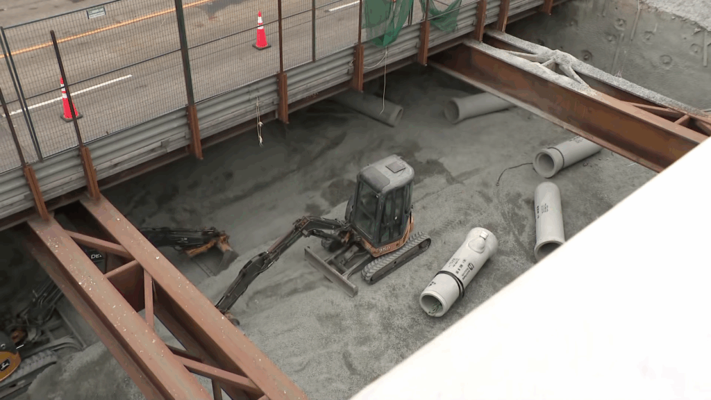 Cement being poured into the Broadway Subway line.