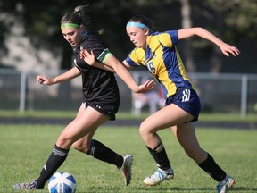 Pain Court's Amelia Kearney (16) battles Lajeunesse's Liliana D'Agostini (9) in the SWOSSAA senior girls A soccer final at Ecole Secondaire de Pain Court in Pain Court, Ont., on Thursday, May 28, 2026. Mark Malone/Chatham Daily News/Postmedia Network