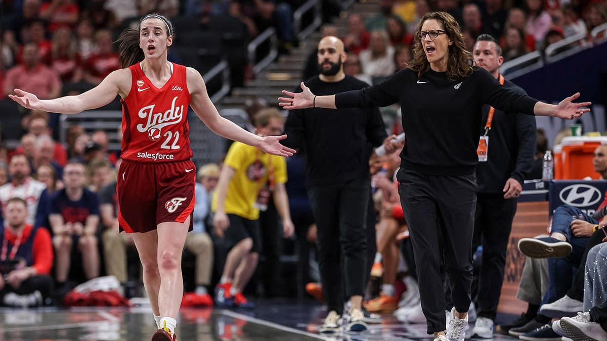 Caitlin Clark reacts to a call during a game