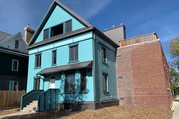 The Ches-Way Apartments, located in the residential Wolseley neighbourhood, won a Residential Conservation Award. Like Roslyn Square, Ches-Way comprises two buildings. One is a two-and-a-half-storey wood-frame house that was built early in the 20th century. The other half is a two-and-a-half-storey apartment block behind the house that was built in 1930.