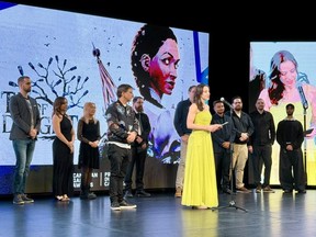 Representatives of Compulsion Games receive the award for