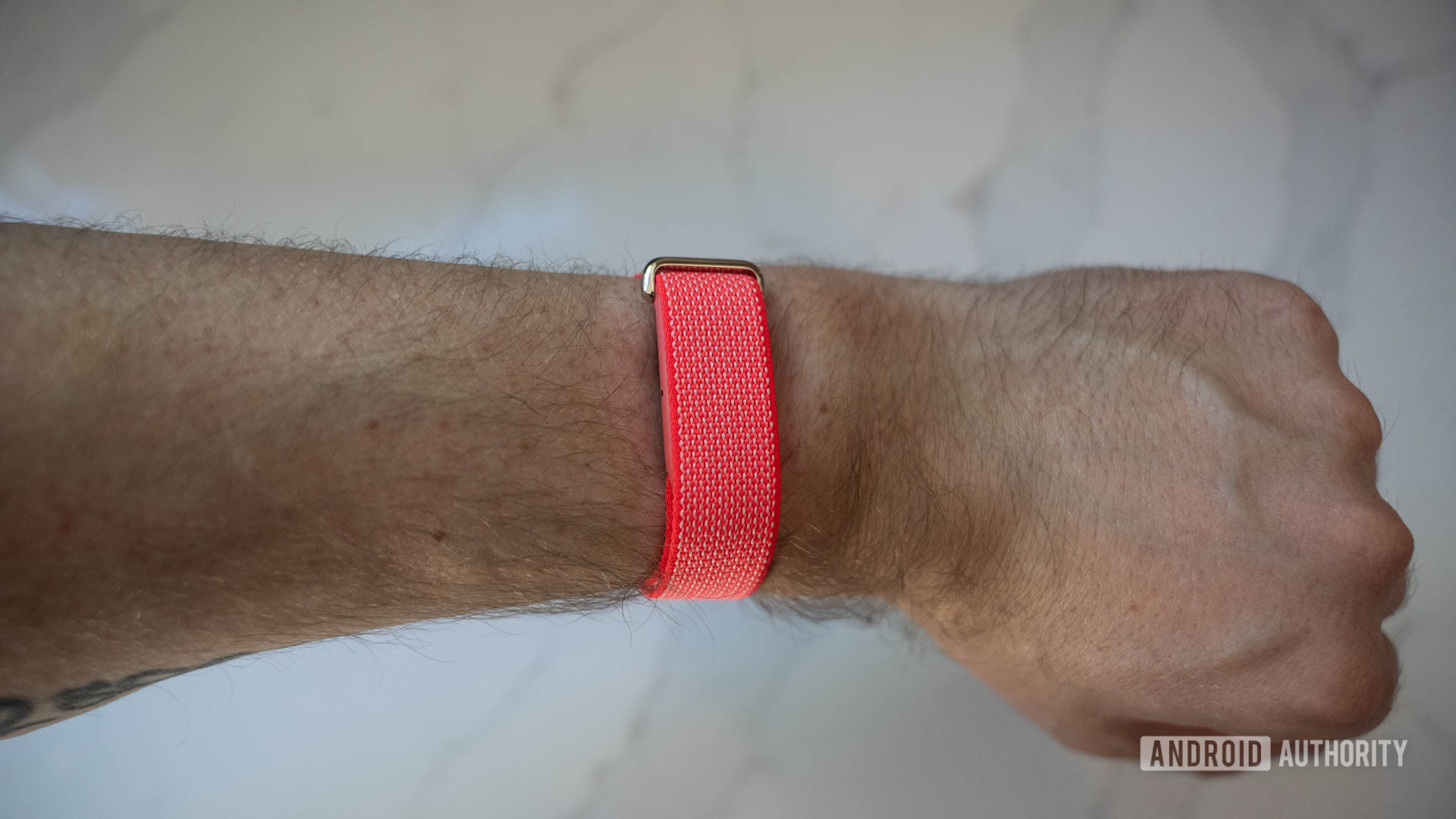 Fitbit Air Berry on wrist top Fitbit Air Berry on wrist top