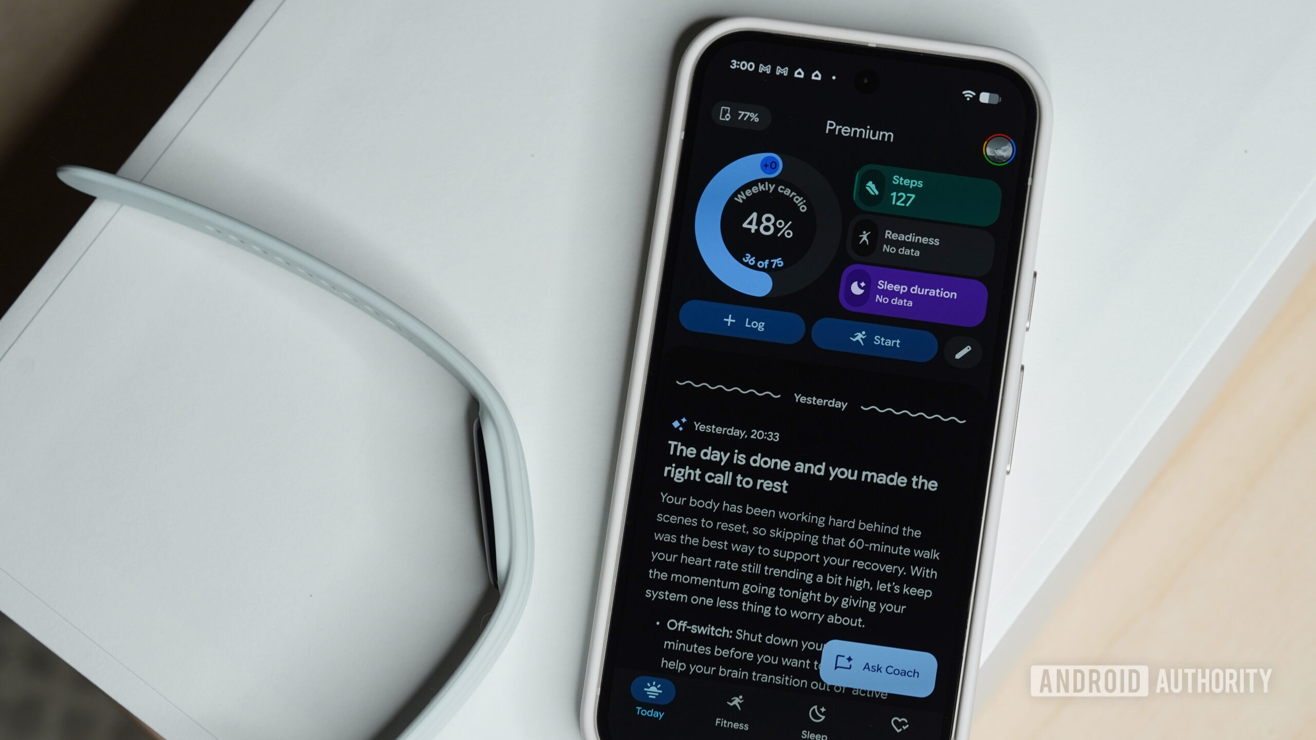 Fitbit Air Health Coach A Pixel 9 displays the new Google Health app.