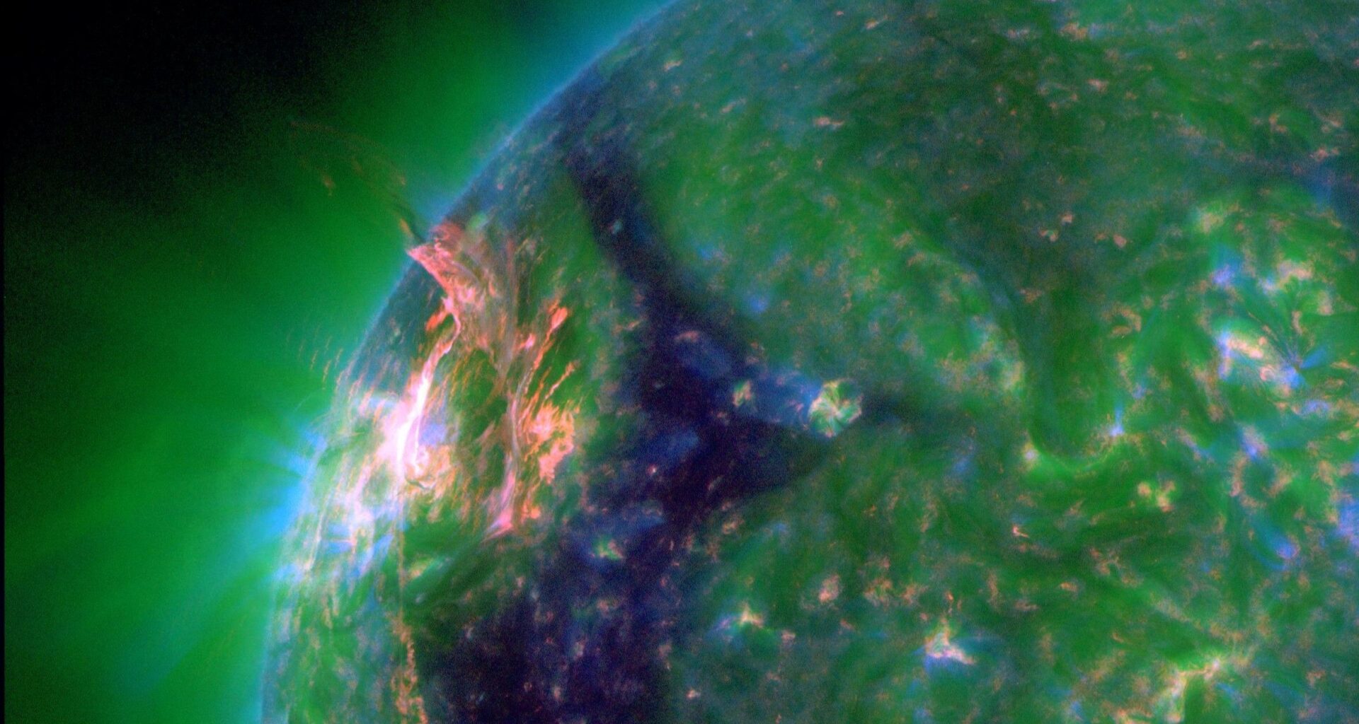 Eruption blows hole in sun's atmosphere, unleashing solar flare and potentially triggering northern lights