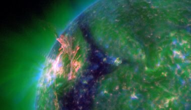 Eruption blows hole in sun's atmosphere, unleashing solar flare and potentially triggering northern lights