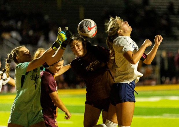 Windsor's Kyle Martinez (8) heads the ball during a first round game of the CHSSA girl's soccer state championship against Dakota Ridge at Windsor High School in Greeley on Thursday, May 7, 2026. (Brice Tucker/Staff Photographer)