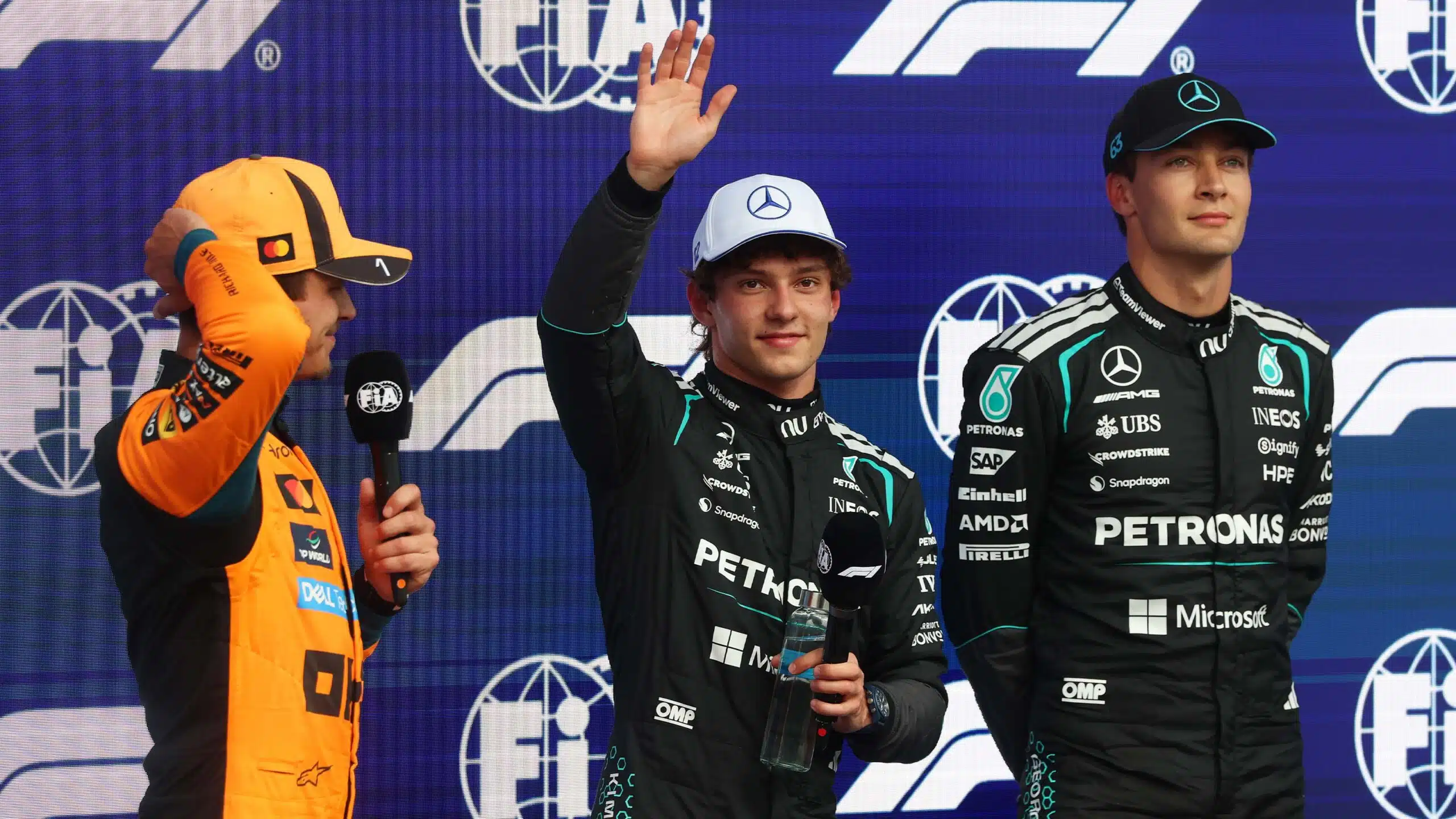George Russell with Kimi Antonelli and Lando Norris after qualifying for the 2026 F1 Canadian Grand Prix