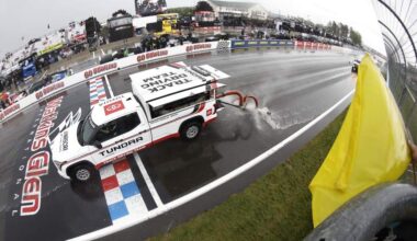 NASCAR track drying vehicles work on the wet frontstretch at Watkins Glen International before the Go Bowling at The Glen race weekend.