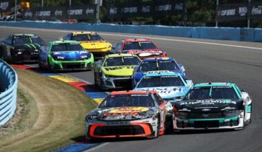 Chase Briscoe leads a pack of NASCAR Cup Series cars through a turn during the Go Bowling at The Glen race at Watkins Glen International.