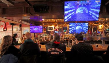 Patrons at Phoenix Landing in Cambridge watch the FIFA World Cup 2026 draw on Dec. 5, 2025.