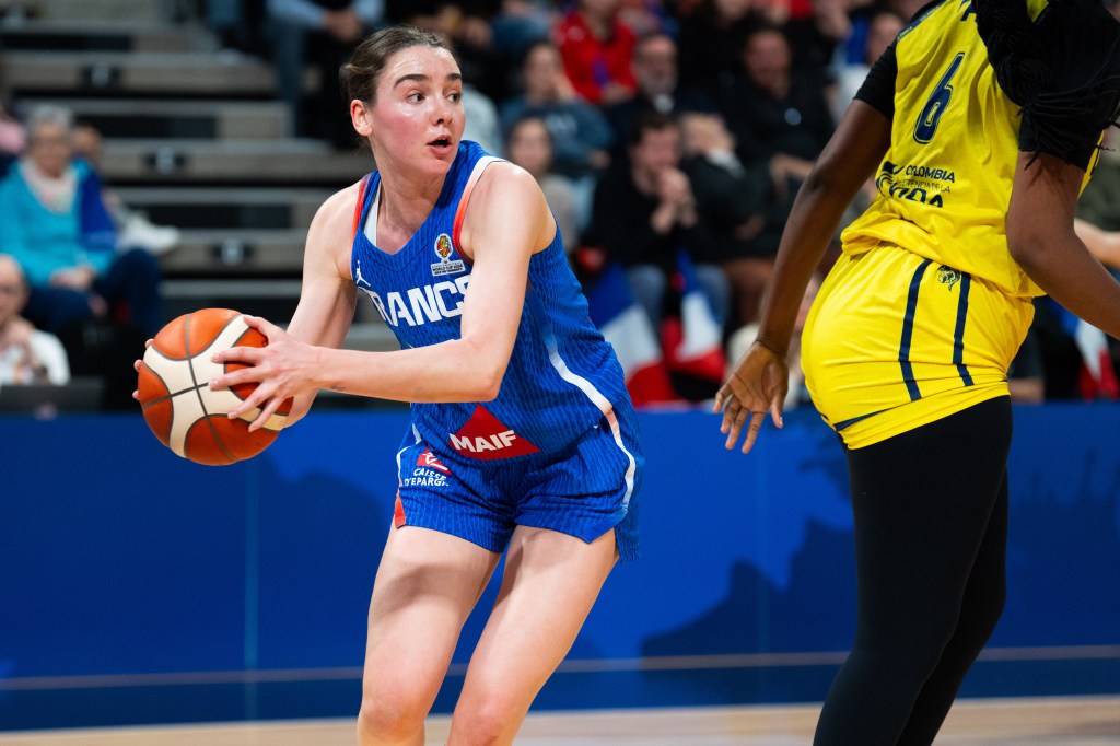 Pauline Astier of France drives to the basket during the Women's World Cup 2026 Qualifier between Columbia and France at the Astroballe on March 12, 2026 in Villeurbanne, France. 