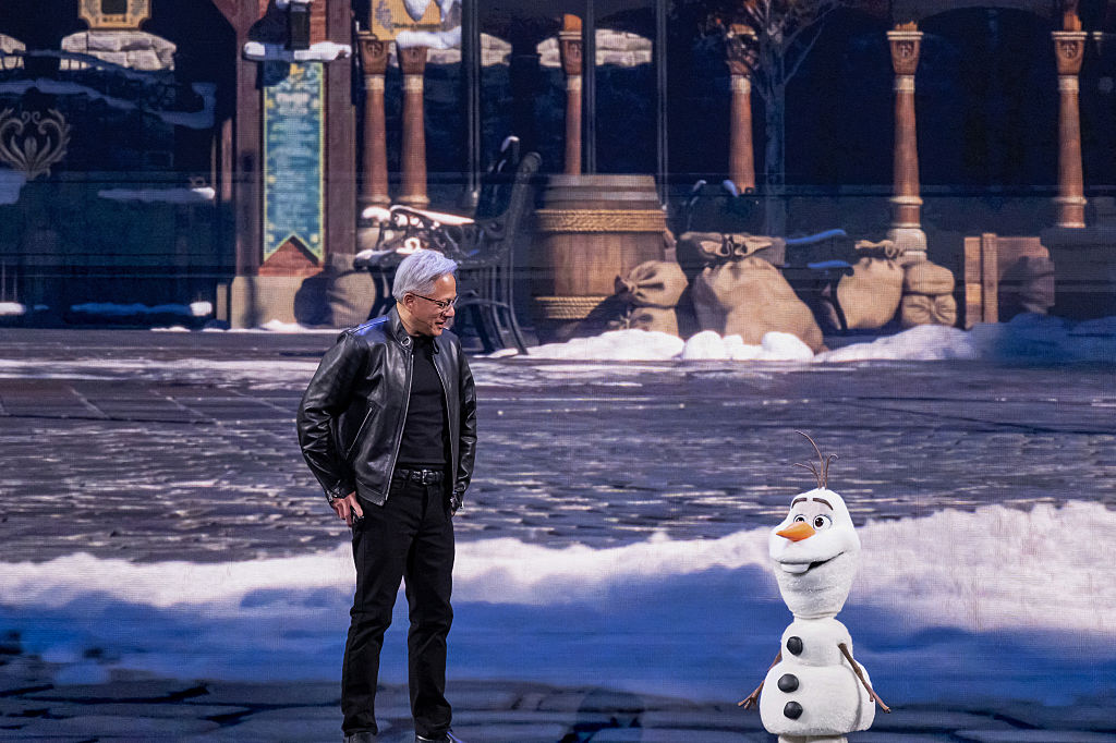 Jensen Huang, chief executive officer of Nvidia Corp., and Olaf, a robotic character from the Disney movie Frozen, during a keynote address at the Nvidia GTC conference in San Jose, California, US, on Monday, March 16, 2026. Nvidia Corp., the company at the center of an explosive build-out of AI computing, expects to generate at least $1 trillion from its Blackwell and Rubin chips through the end of 2027.