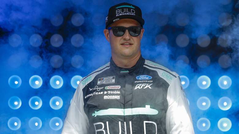 Ryan Preece walks onstage during driver introductions before a NASCAR Cup Series race at Talladega Superspeedway.