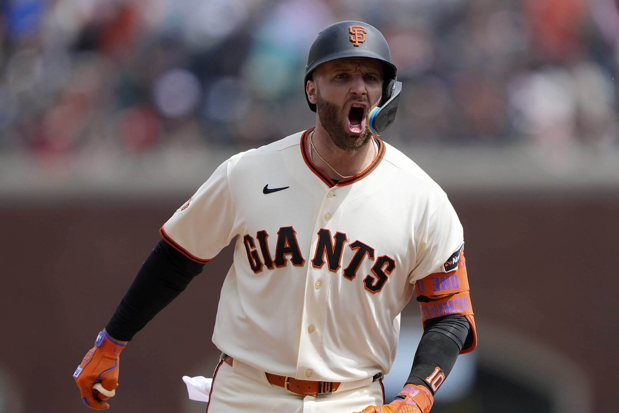 Casey Schmitt #10 of the San Francisco Giants celebrates on the base paths his three-run home run against the Miami Marlins in the bottom of the seventh inning at Oracle Park on April 26, 2026 in San Francisco, California.