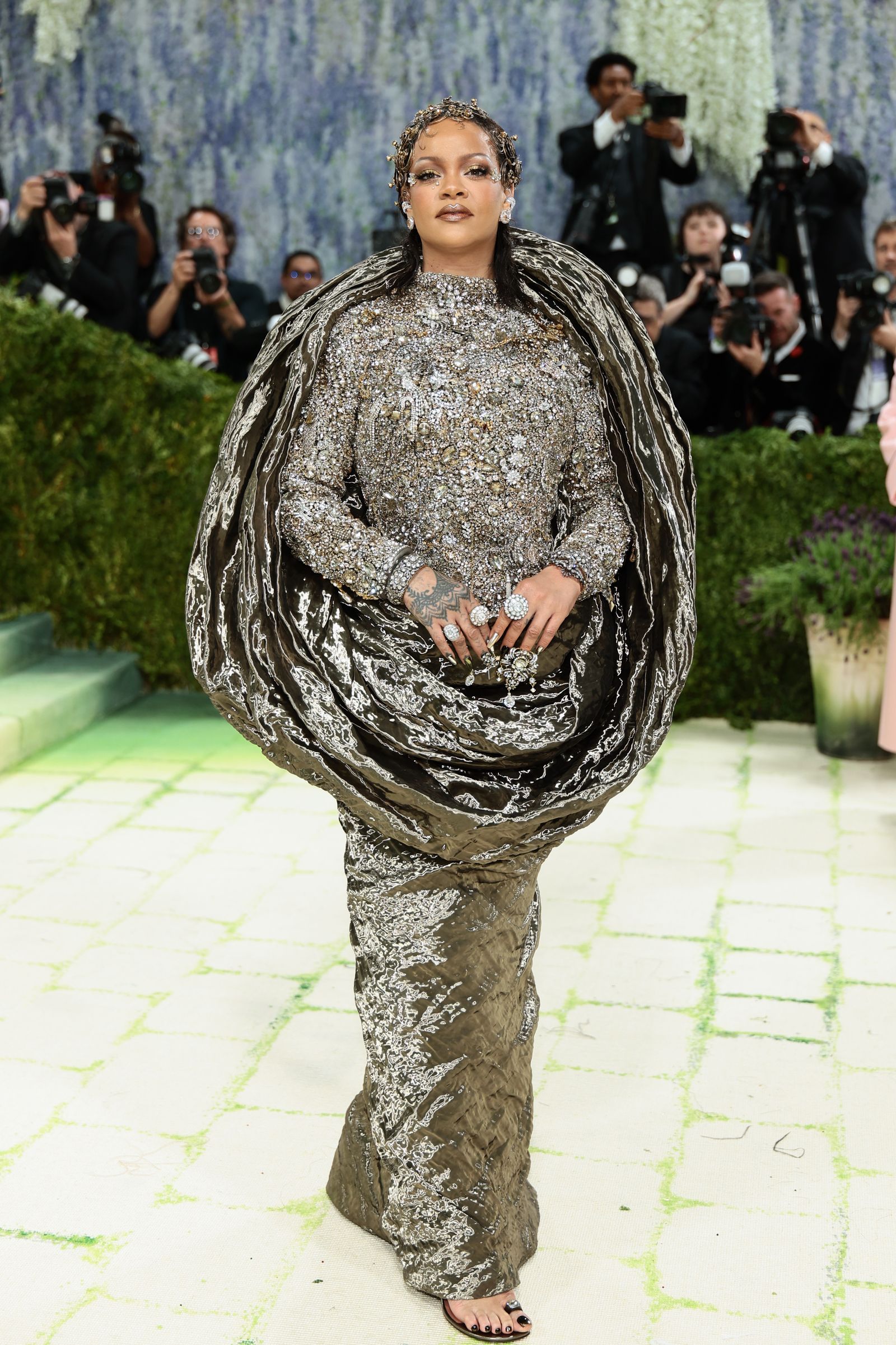Image may contain Rihanna Booker Ervin Person Adult Wedding Formal Wear Fashion and Photography