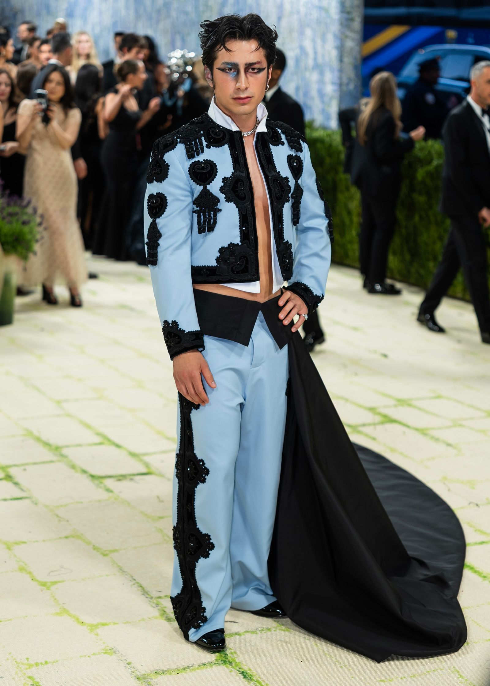 Image may contain Gregg Barnes Person Adult Clothing Formal Wear Suit Footwear Shoe Coat Wedding and Accessories