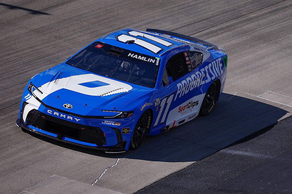 DOVER, DELAWARE - MAY 15: Denny Hamlin, driver of the #11 Progressive Insurance Toyota, drives during NASCAR Cup Series All-Star Race pit road qualifying entry/exit practice at Dover Motor Speedway on May 15, 2026 in Dover, Delaware. (Photo by Sean Gardner/Getty Images)