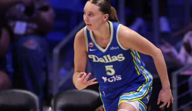 ARLINGTON, TEXAS - MAY 18: Paige Bueckers #5 of the Dallas Wings reacts after scoring during the fourth quarter against the Washington Mystics at College Park Center on May 18, 2026 in Arlington, Texas.