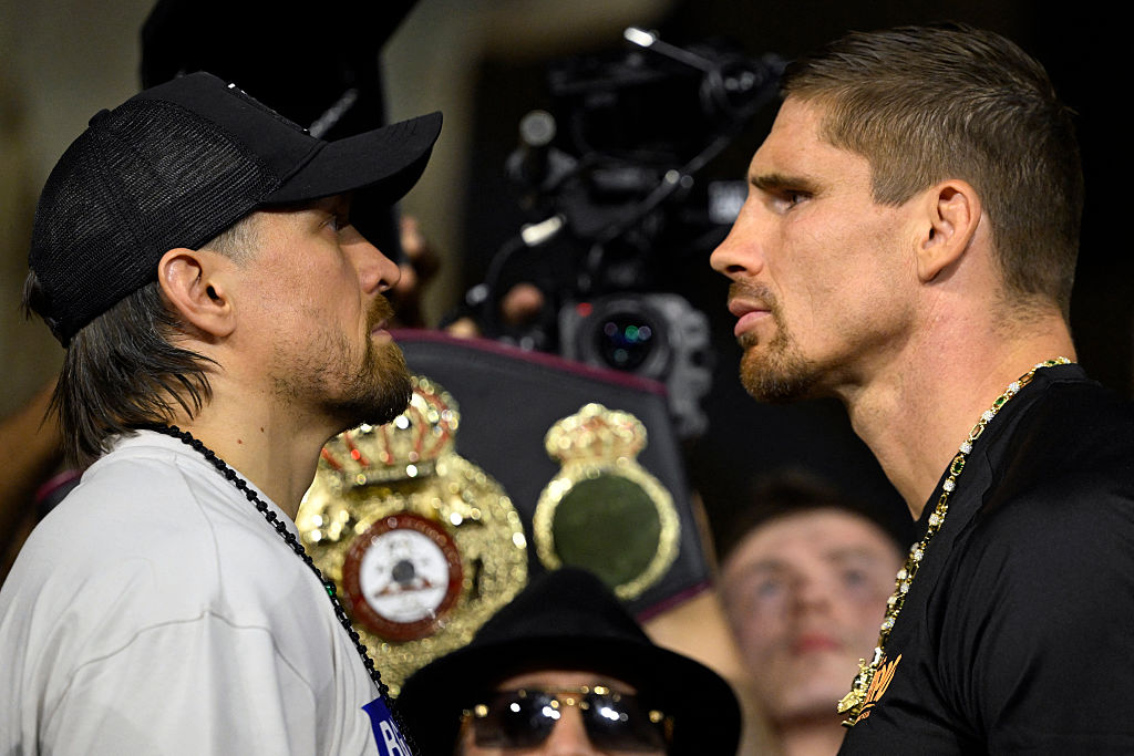 Ukraine's Oleksandr Usyk (L) faces off with Netherlands' Rico Verhoeven during the ceremonial weigh-in ceremony at the Grand Egyptian Museum in Giza on May 22, 2026, on the eve of their WBC World Heavyweight Championship 'Glory in Giza' boxing match in Egypt. (Photo by Khaled DESOUKI / AFP via Getty Images)