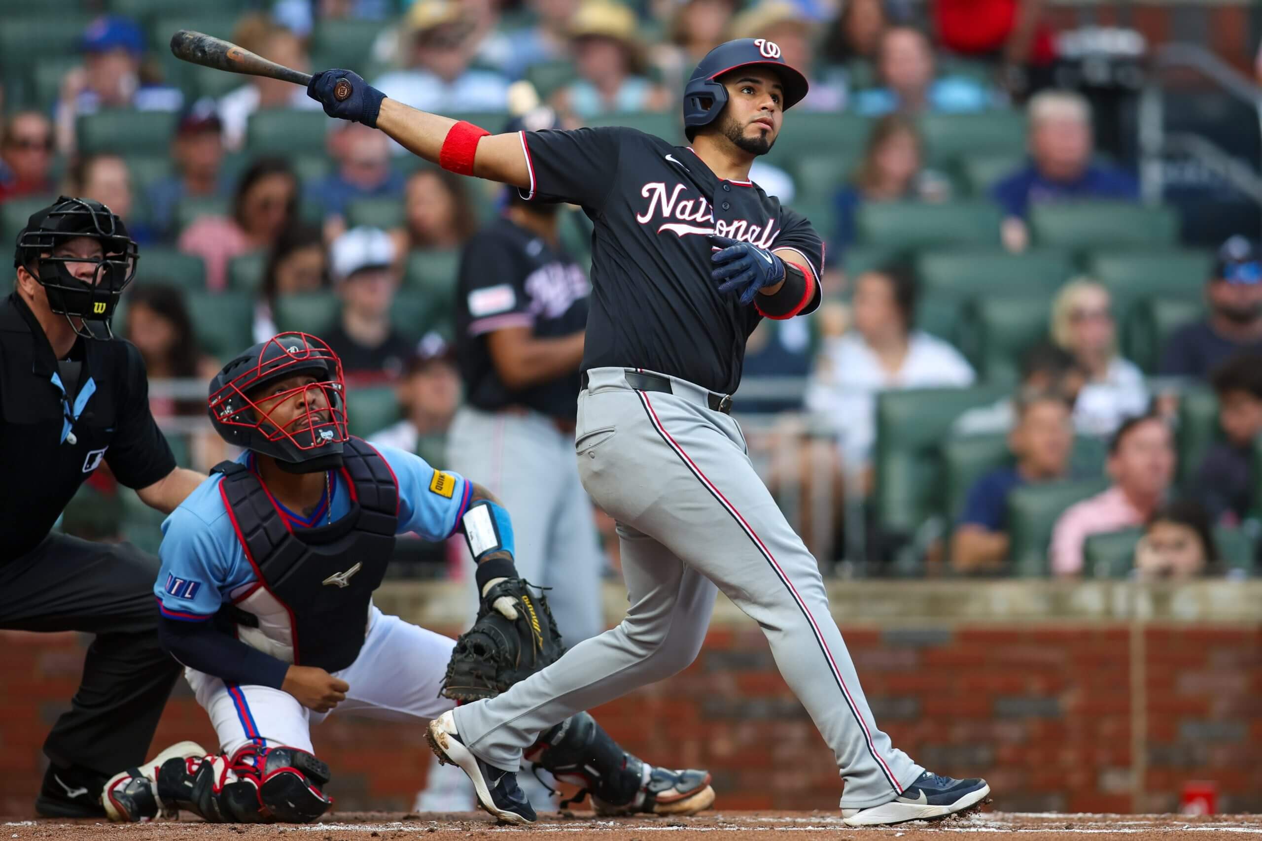 Keibert Ruiz swings the bat during a game.