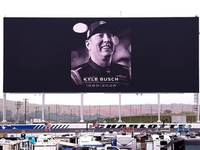 Signage is seen honouring the late Kyle Busch ahead of practice for the NASCAR Craftsman Truck Series North Carolina Education Lottery 200 at Charlotte Motor Speedway on May 22, 2026 in Concord, North Carolina.