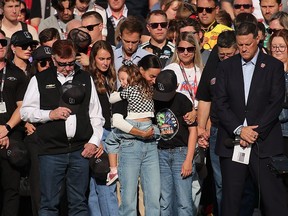 (L-R) NASCAR Hall of Famer and RCR team owner, Richard Childress, Samantha Busch (wife) Lennix Busch (daughter) Brexton Busch (son) and NASCAR Chief Executive Officer Steve O’Donnell stand on the grid during the remembrance ceremony for Kyle Busch, who passed away suddenly at the age of 41, prior to the NASCAR Cup Series Coca-Cola 600 at Charlotte Motor Speedway on May 24, 2026 in Concord, North Carolina.