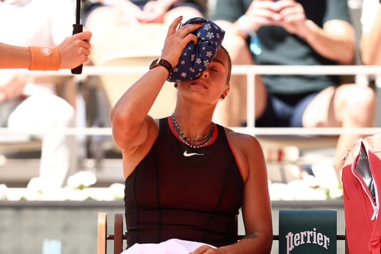 Aryna Sabalenka cools down with an ice pack in her match against Jessica Bouzas Maneiro of Spain during the Women's Singles first round match during Day Three of the 2026 French Open at Roland Garros