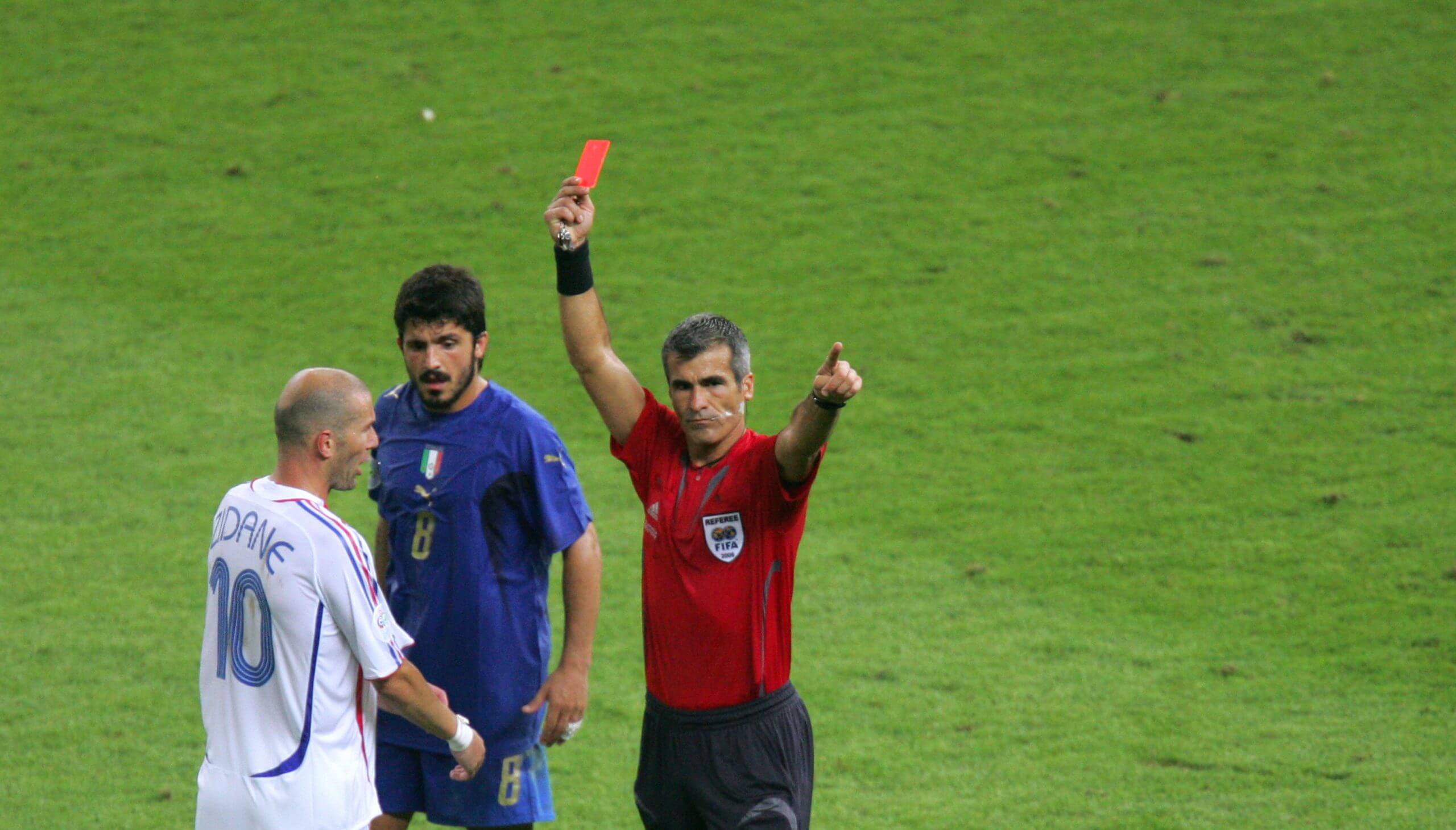 Referee Horacio Elizondo brandishes the red card at Zinedine Zidane