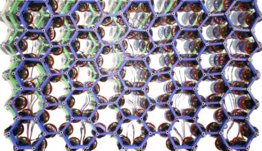 Hexagonal Active Metamaterial Lattice Demonstrates Collective Motion and Elasticity Properties