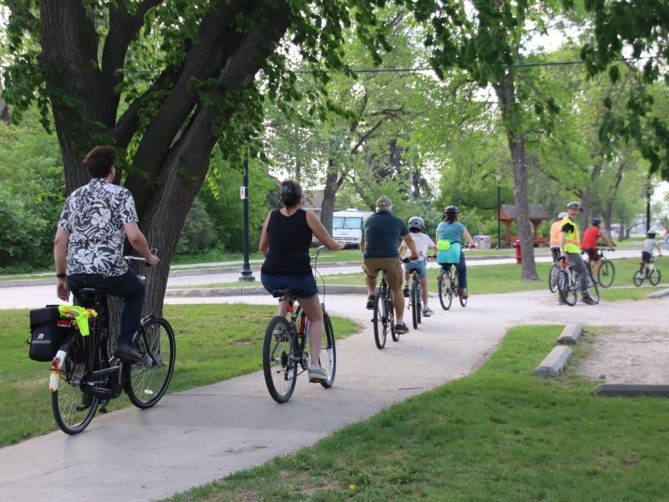 Strong Town Family Bike Jam participants beginning their bike ride.