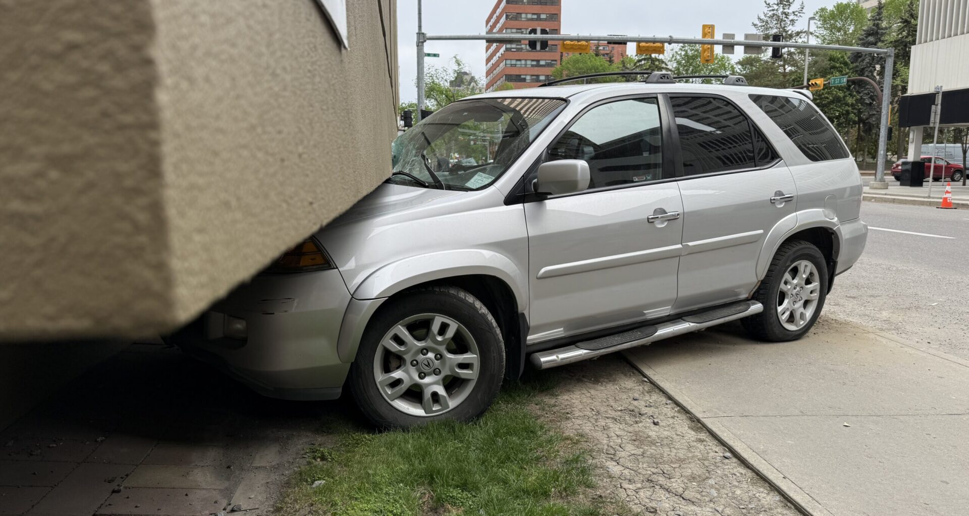 SUV crashes into downtown Calgary building