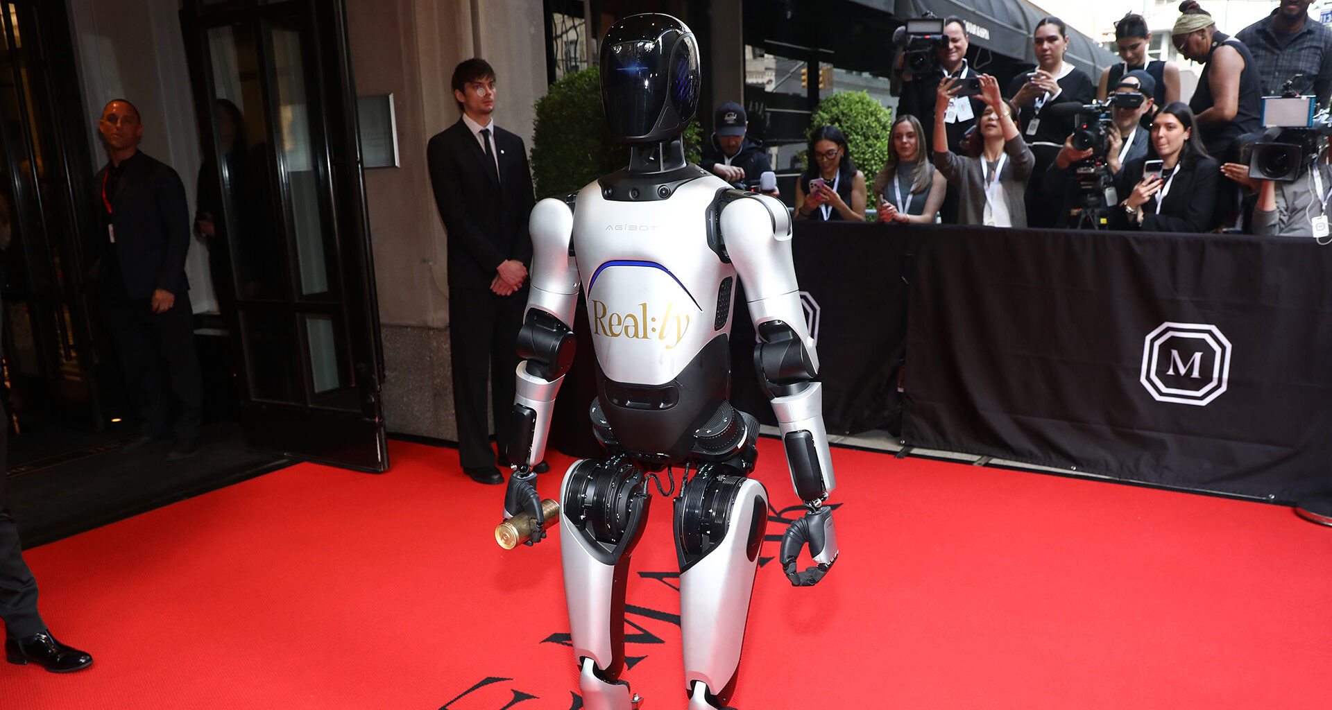 AgiBot ROBOT nabs spotlight ahead of Met Gala red carpet as it poses for cameras outside famous hotel
