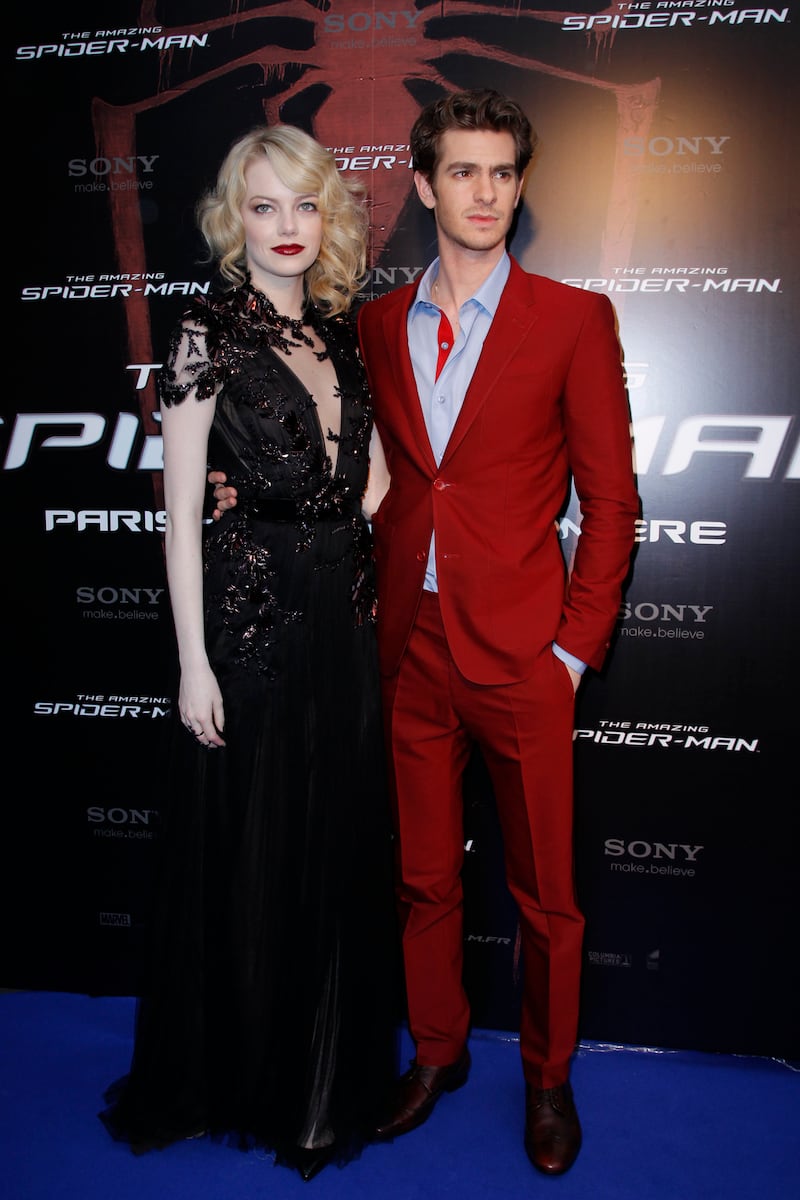 Emma Stone has undergone dramatic hair transformations for her movie roles. Pictured here as a platinum blonde for "The Amazing Spider-Man," with her co-star Andrew Garfield in 2012.