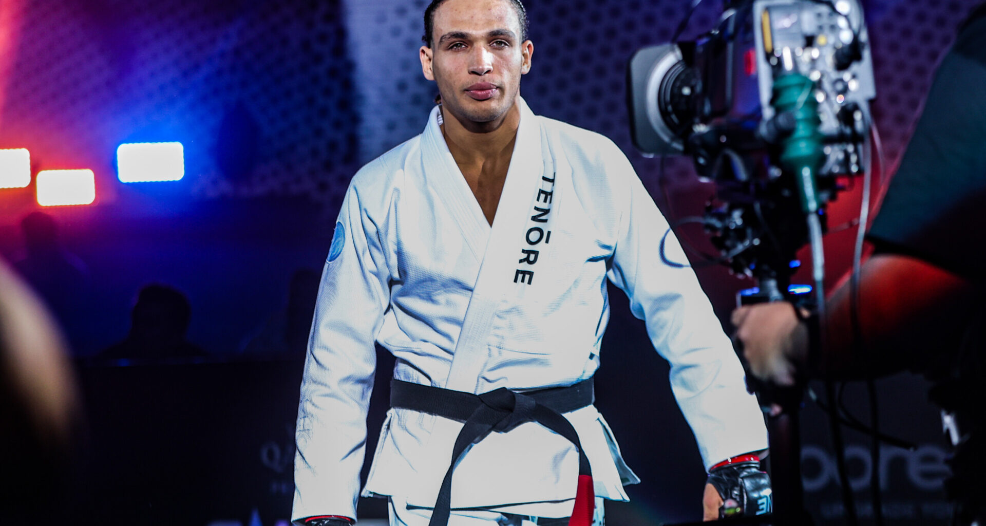 Kade Ruotolo enters the ring wearing his gi
