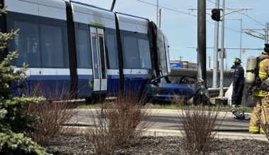 Car catches fire after colliding with LRT on Whitemud overpass