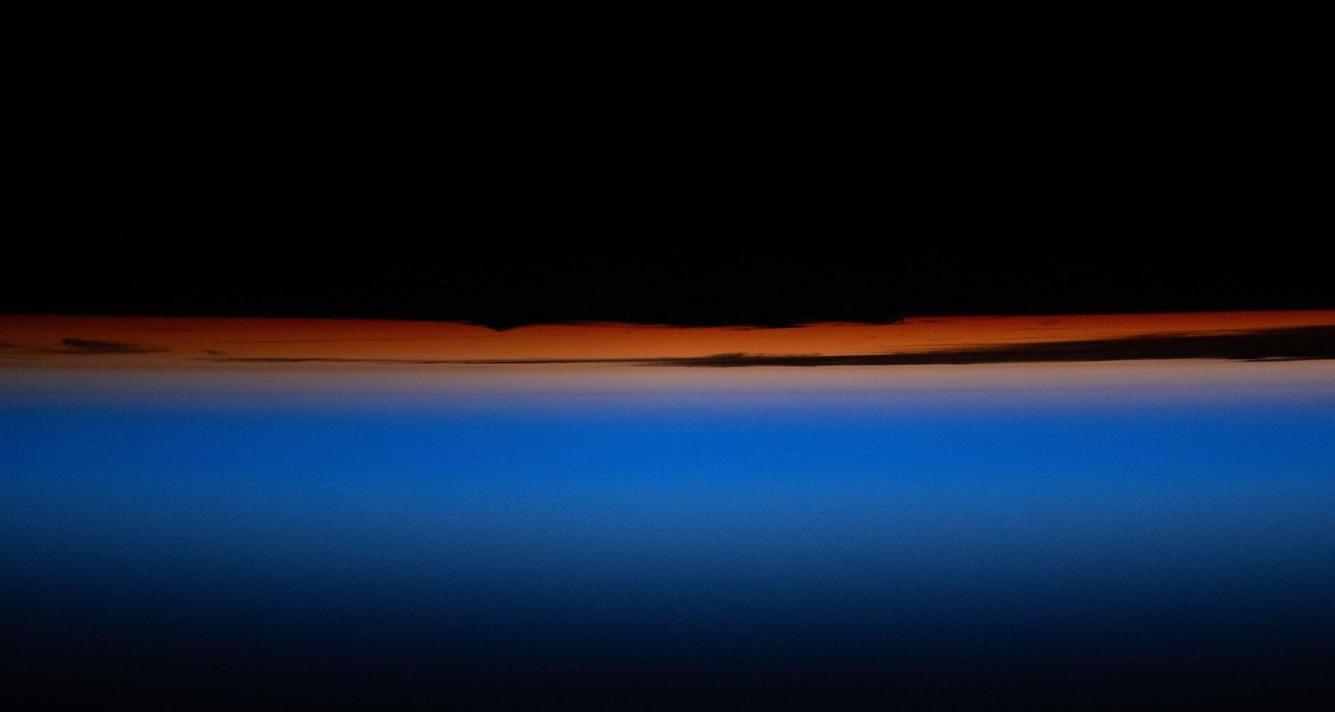 Nothing beats a beautiful sunset (from space) photo of the day for May 26, 2026