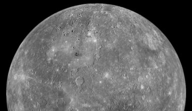 Nearby super-Earth hot and airless: View of half a gray, rocky planet covered on craters.