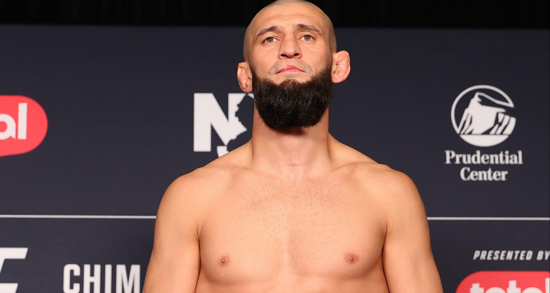 Khamzat Chimaev on the scale at the UFC 328 official weigh-in