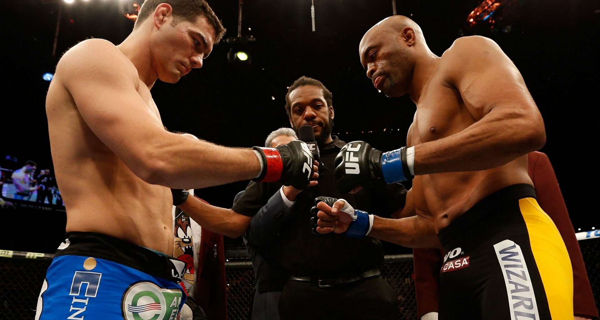Chris Weidman and Anderson Silva touch gloves ahead of their fight