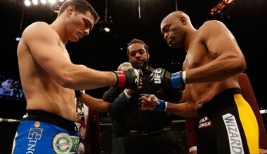 Chris Weidman and Anderson Silva touch gloves ahead of their fight