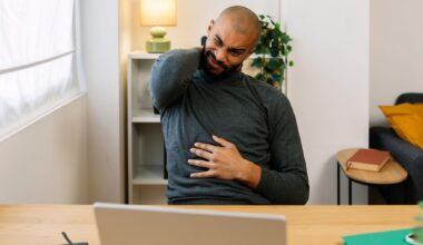 A Pilates master trainer says anyone who works at a desk should use these three moves to promote a pain-free posture