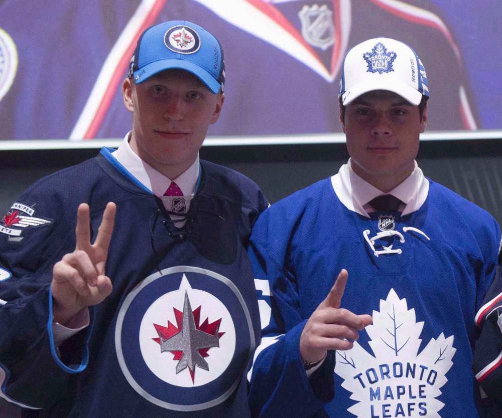 Nathan Denette / The Canadian Press Files
The Winnipeg Jets entered the 2016 NHL draft lottery in the No. 6 spot and jumped to No. 2, allowing them to select Patrik Laine (left) while the Toronto Maple Leafs held onto No. 1 spot, and picked Auston Matthews that year.