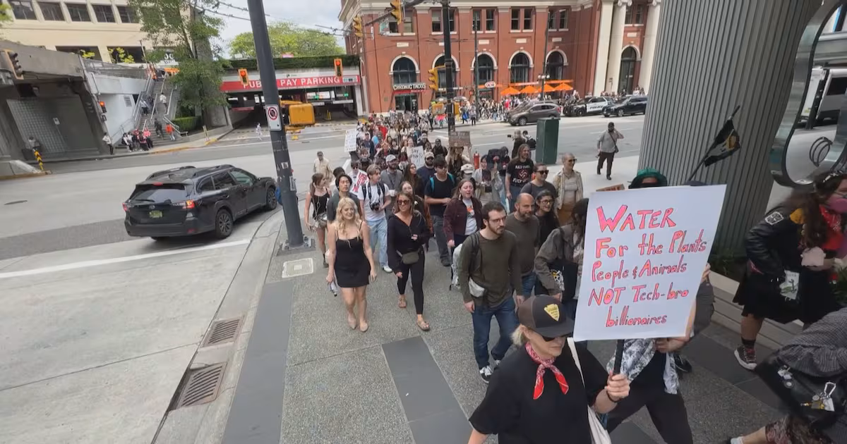 Hundreds march in opposition to AI data centres in Vancouver - CTV News